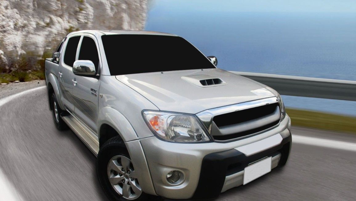Bumper (Preto/Prata) 05/08 Hilux * 